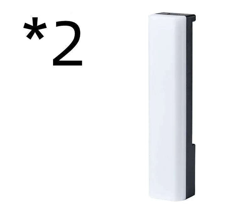 3D RGB voice-activated ambience lamp in black or white on a gaming desk.