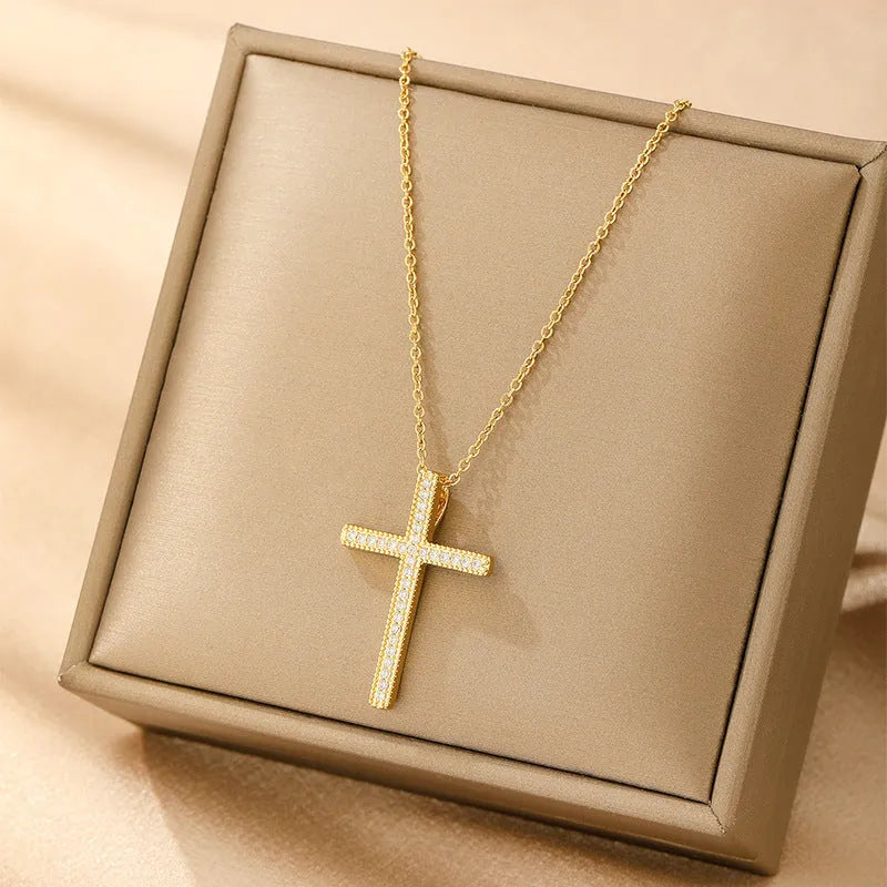 Women's copper electroplated necklace showing heart, round diamond, butterfly, and cross pendant shape options.