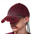 Rose red cotton peaked cap with adjustable strap and vintage spray-dirty finish