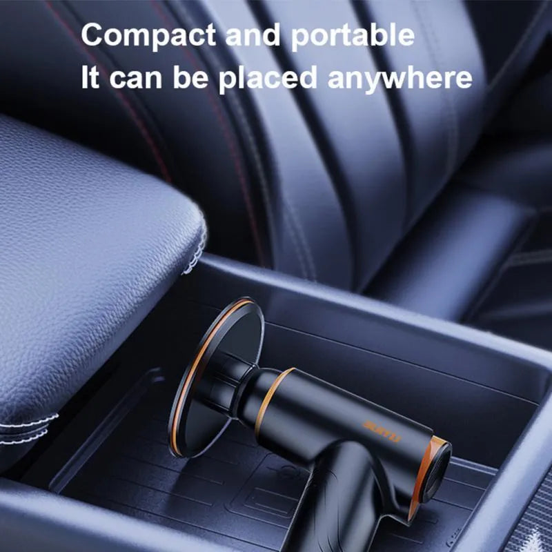 Cordless car polishing machine with black ABS body, orange waxing pad, and 12cm disc on a table