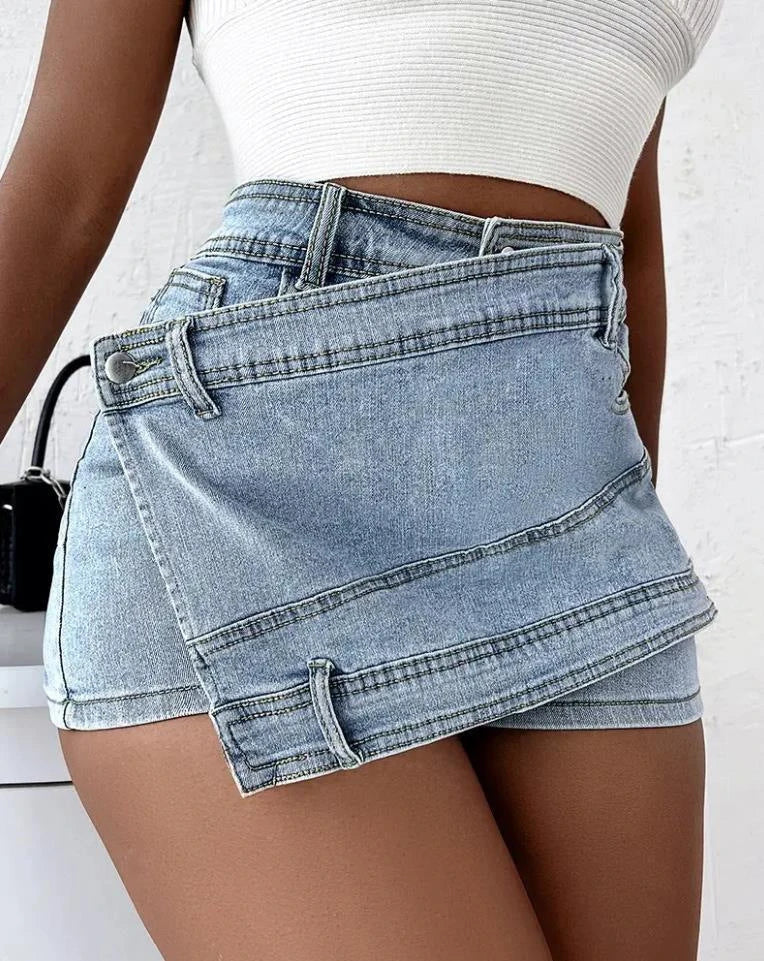 Stylish Y2K-inspired denim shorts with an asymmetrical hem, offering a trendy and comfortable fit.