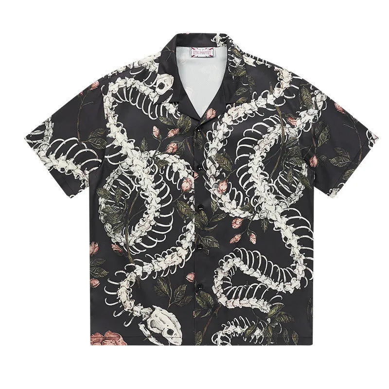 Short sleeve Cuban collar shirt with a snake bone pattern print in a loose fit.