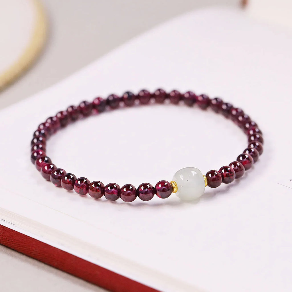 Natural garnet U-shaped womens bracelet in 18mm size with 4mm or 6mm stone options.