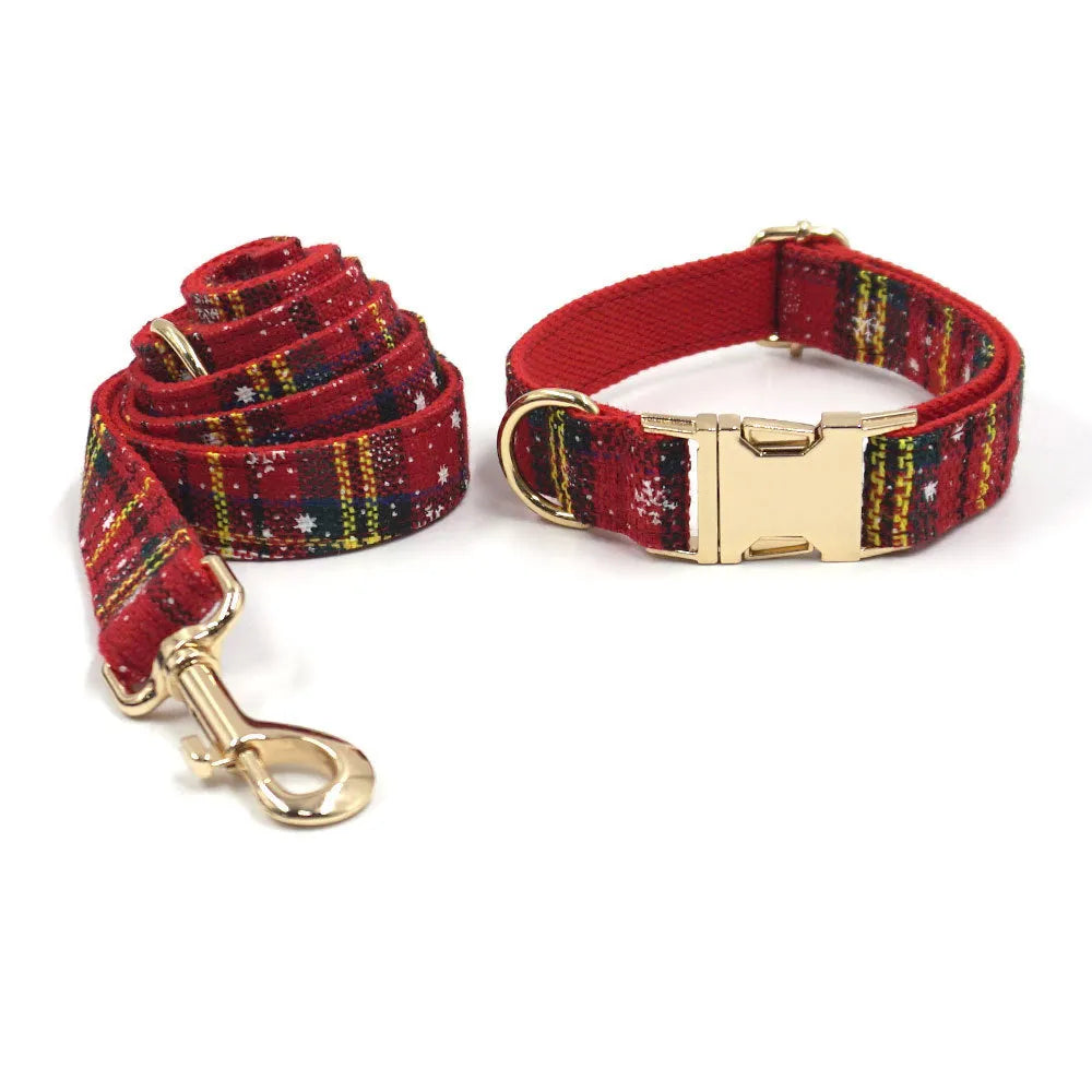 Red cloth Christmas dog collar and harness set with matching bow tie and waste bag holder on size tag