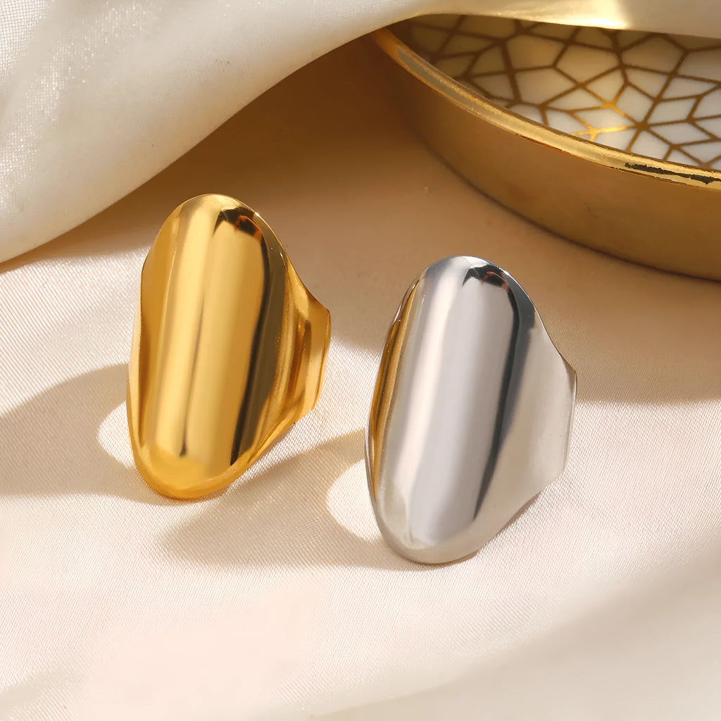 Exaggerated thick geometric stainless steel ring for women, available in gold and steel colour options