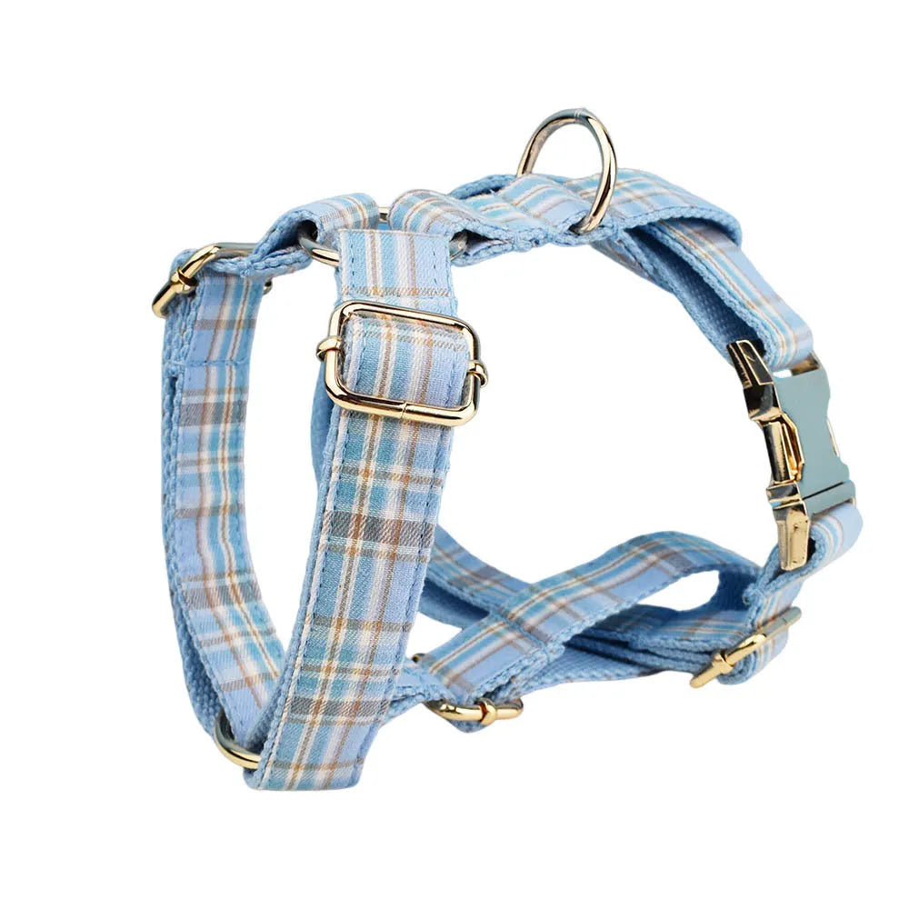 Sky blue grid patterned dog collar, leash, vest, and bow set from the forest series for pets.