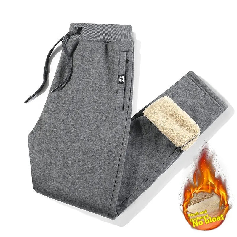 Men's grey fleece-lined cotton track pants with elastic waist and straight leg cut