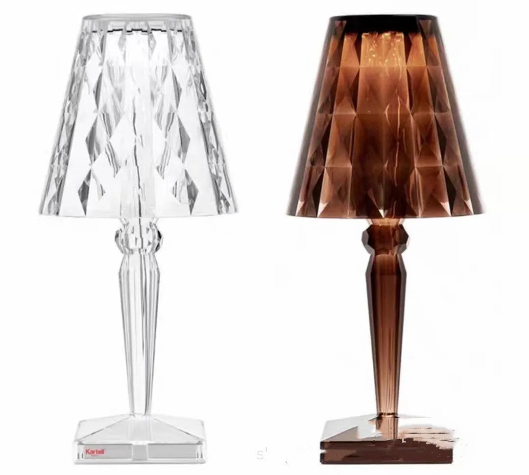 Rose gold portable touch control night light on a surface.
