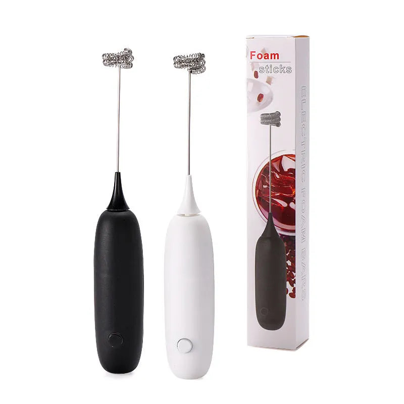 Black and white hand-held electric milk frother with blender function for coffee drinks