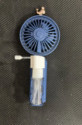 Plastic USB desk fan with adjustable nozzle in apricot colour on wooden desk