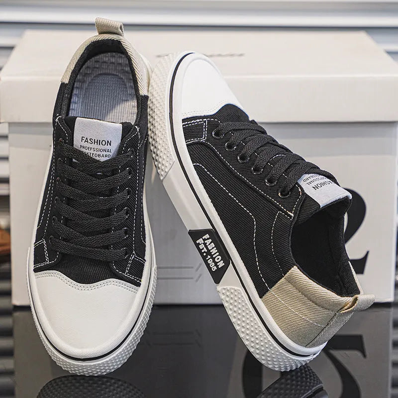 Men's blue canvas casual shoes with round toe and lace-up front, showing PVC sole detail