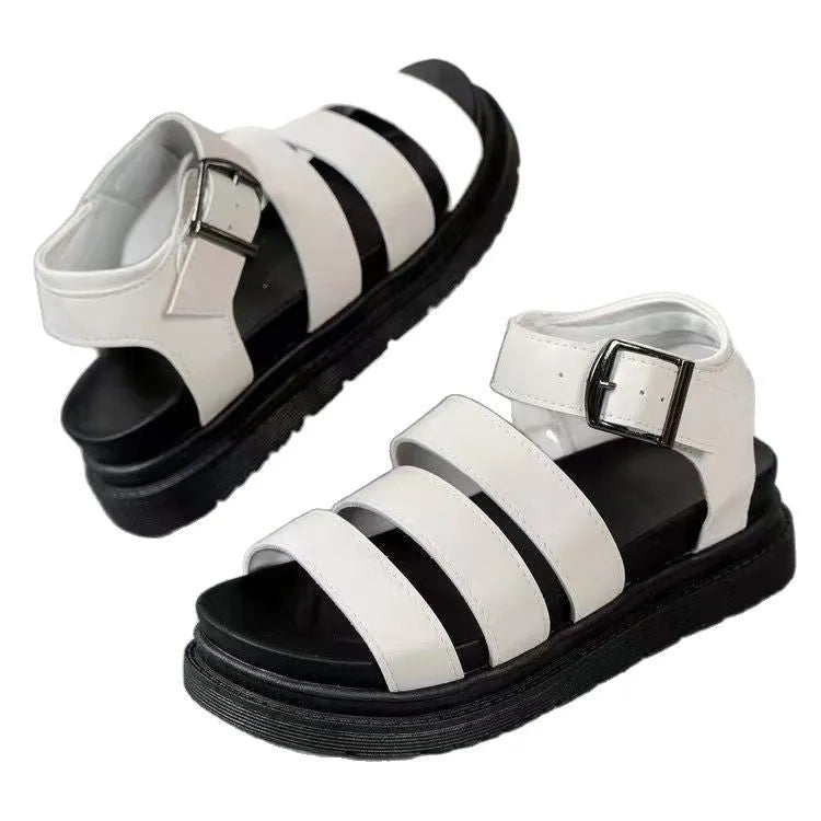 Black outdoor sandals with buckle straps and a thick rubber sole, showing the round toe and fish mouth toe holder design.