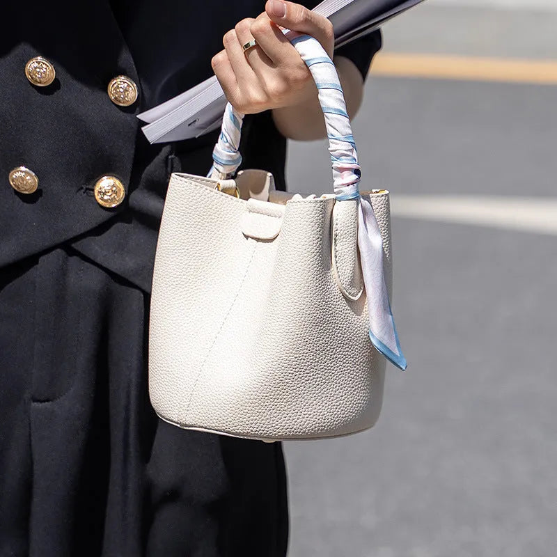 PU leather casual handbag for women with bow detail in golden brown