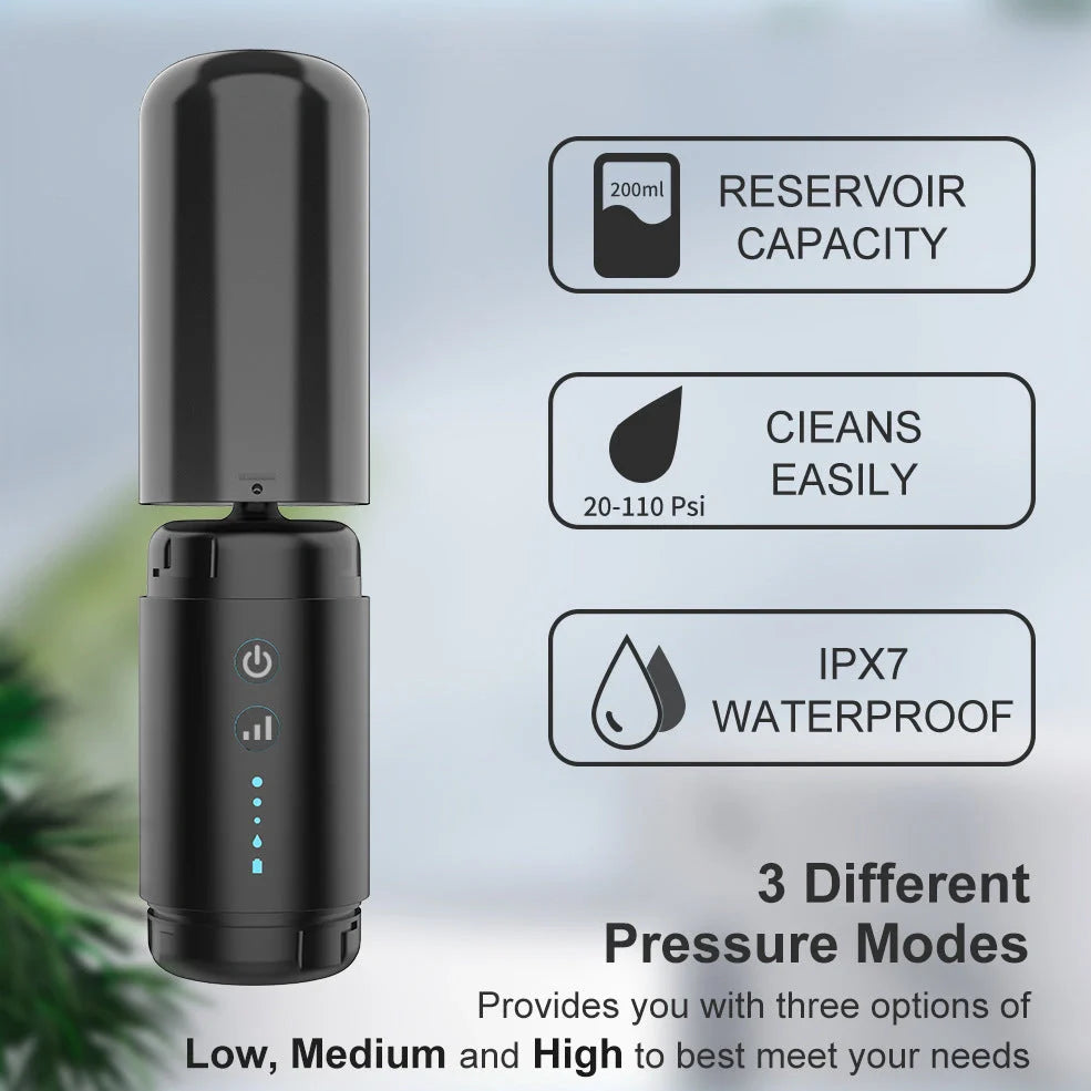 Black silicone ear washer with three nozzles and USB cable on white background