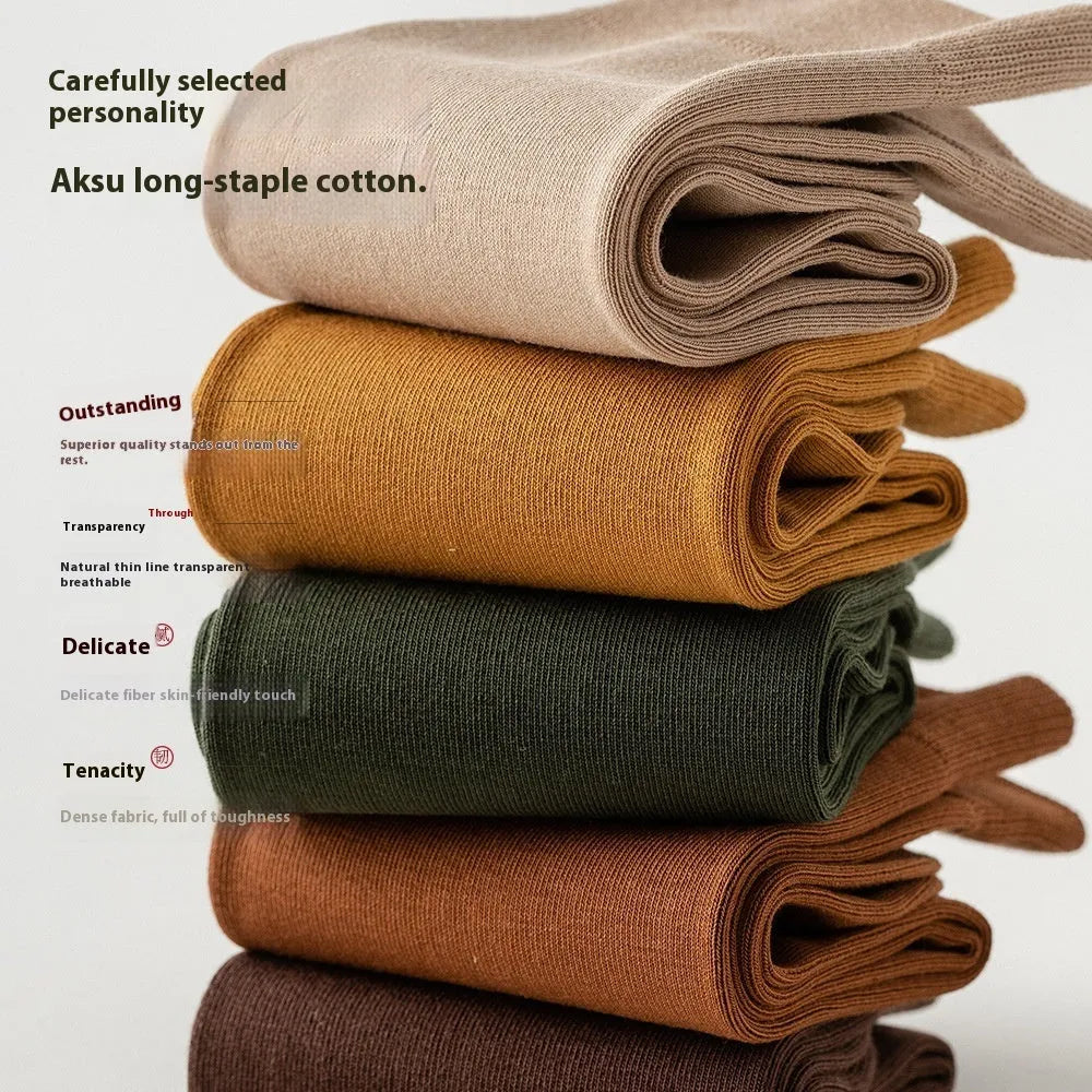 Men's mid-calf business socks in pure combed cotton showing solid colour options including army green, beige, black, and grey