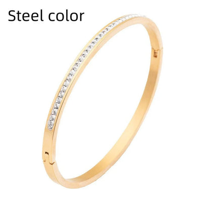 Single row stainless steel bracelet with diamond opening in gold, rose gold, or steel