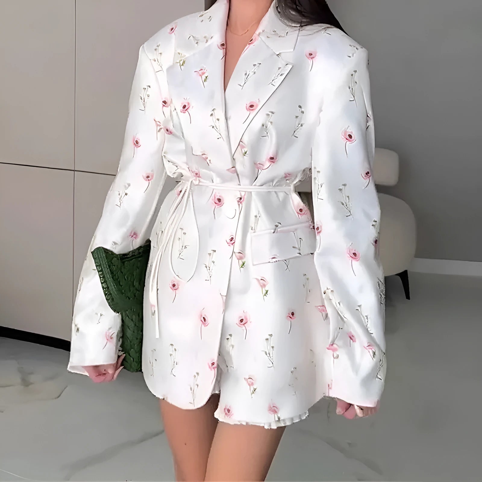 Women's collar lace-up waist-tight suit jacket in polyester, showing front tie detail on a model.