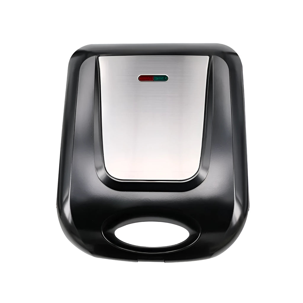 Black nut roasting machine for peanuts and hazelnuts on a kitchen counter.