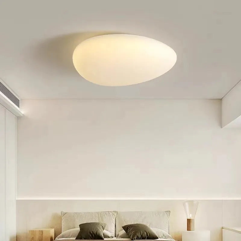 Modern minimalist LED ceiling light in white finish, 23cm diameter, for bedrooms