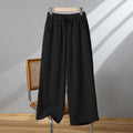 Women's straight-leg casual trousers with elastic drawstring waist in apricot colour.
