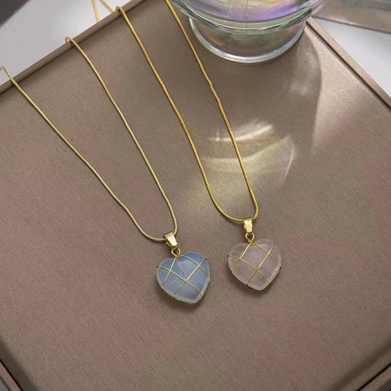 Heart-shaped moonstone pendant necklace with gold plating and adjustable chain