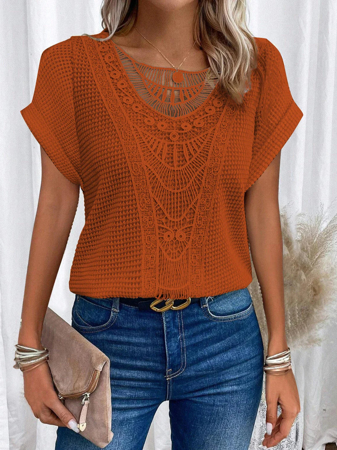 A stylish, cutout short-sleeve tee in various vibrant colors for women's casual summer fashion