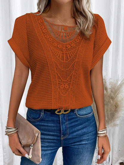 A stylish, cutout short-sleeve tee in various vibrant colors for women's casual summer fashion