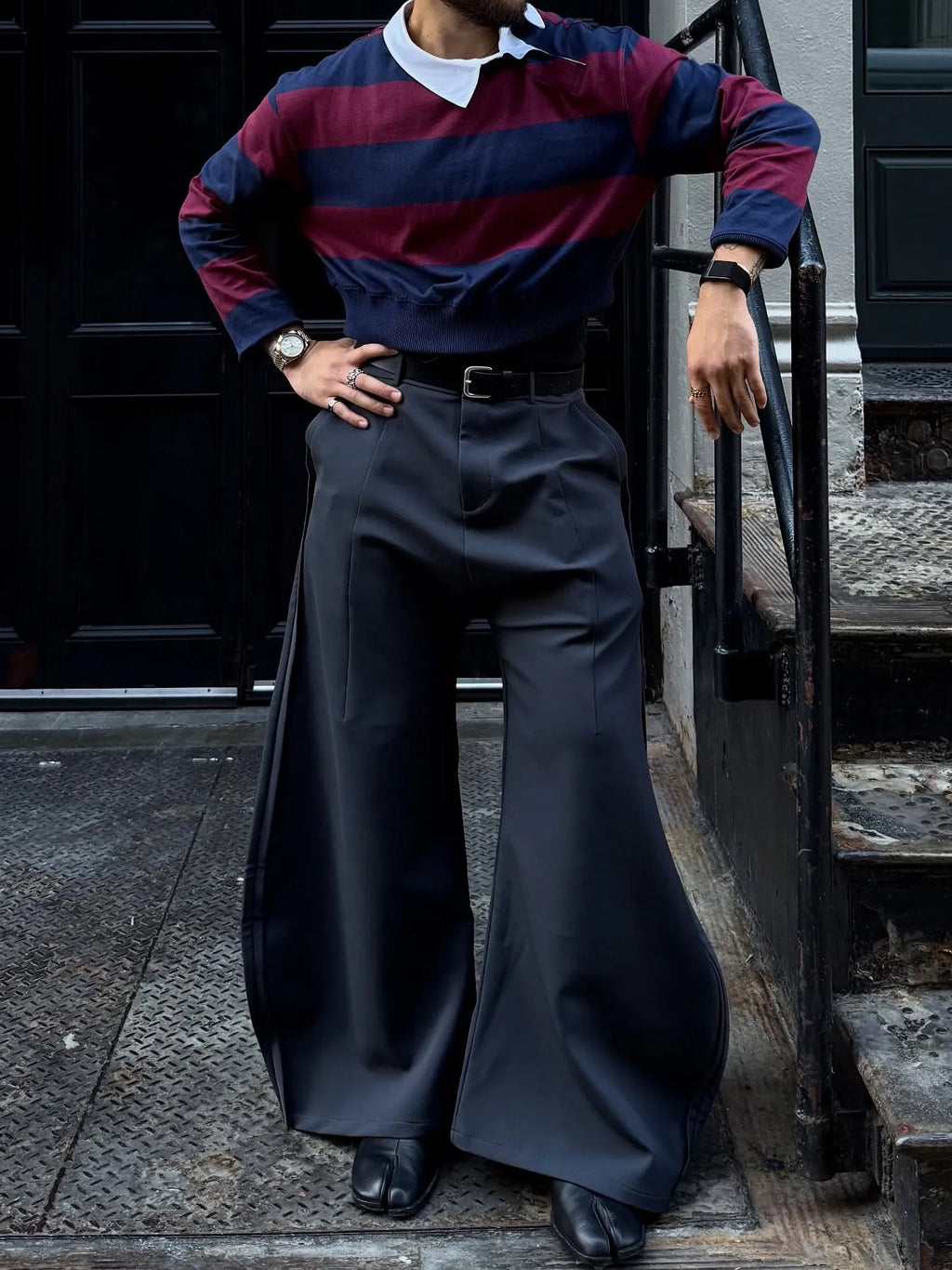 Grey scimitar wide-leg pants made of polyester with regular fit, plain design for casual daily wear.