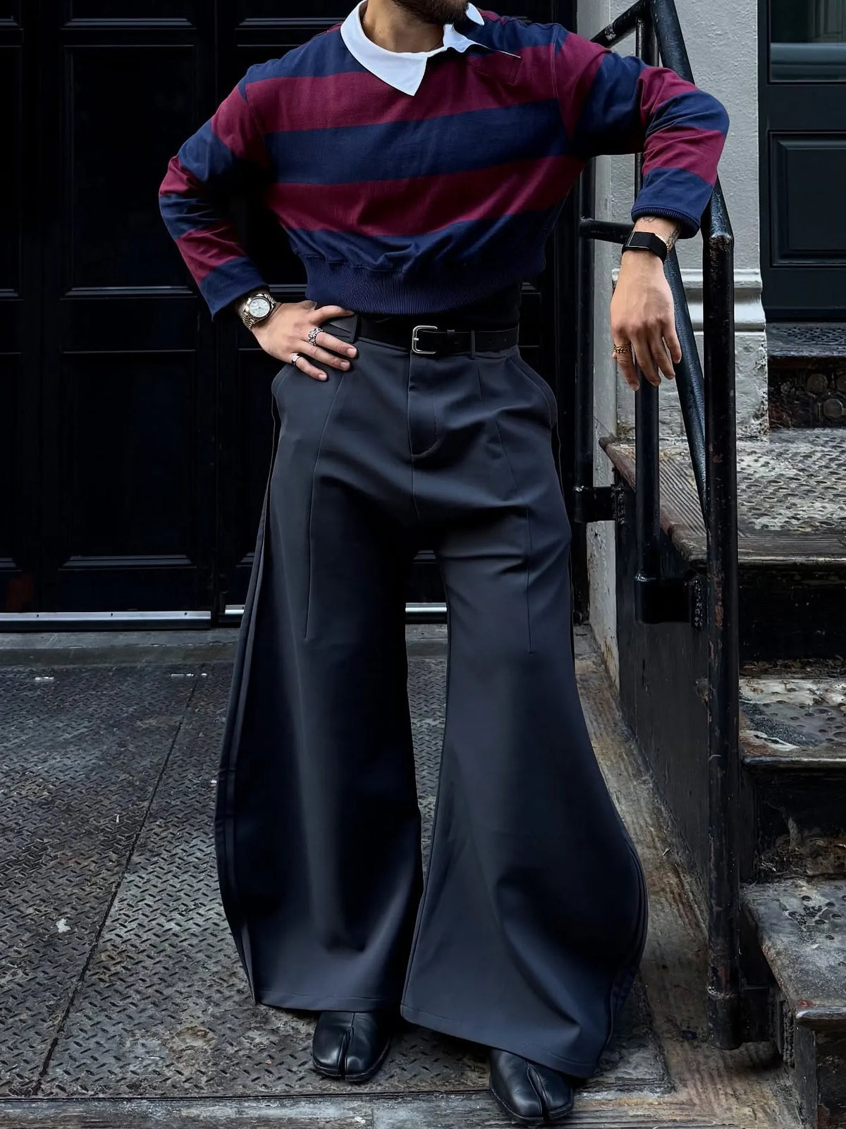 Grey scimitar wide-leg pants made of polyester with regular fit, plain design for casual daily wear.