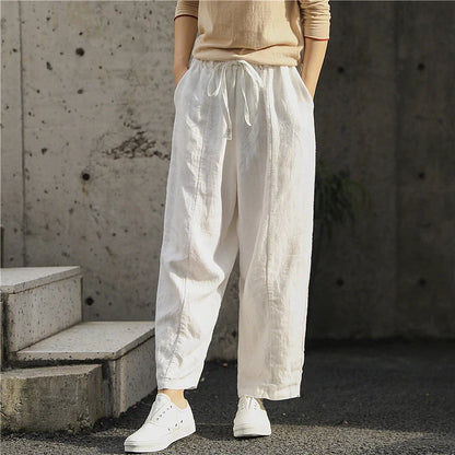 Women's artistic linen baggy pants with embroidery detail in white