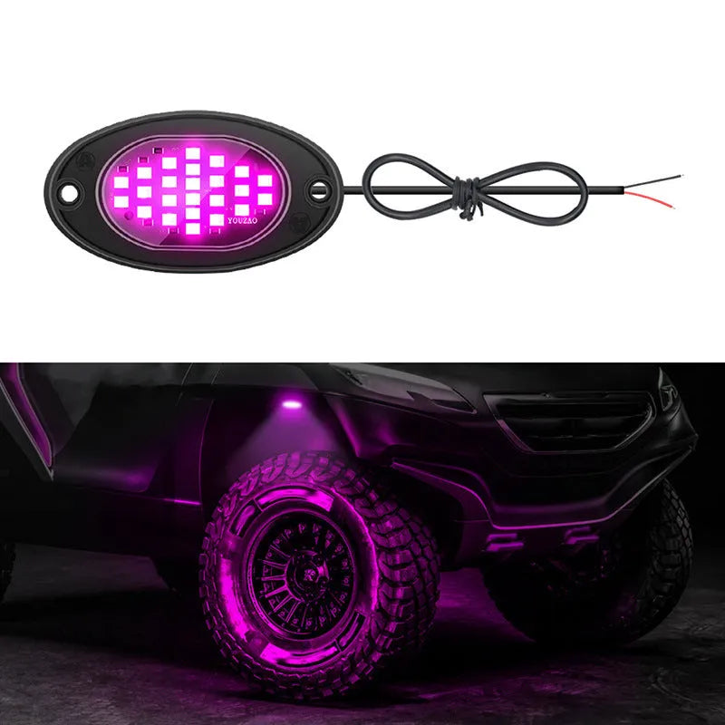 12V car LED chassis ambience light in ABS housing with five colour options on a dark vehicle underside