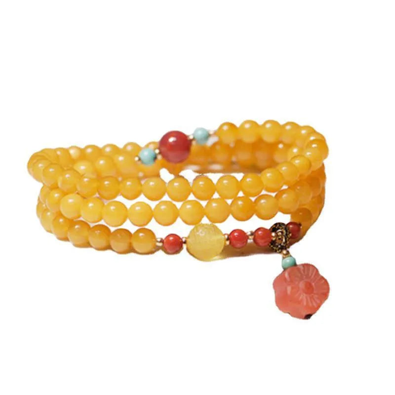 Yellow chicken grease beeswax amber bracelet with animal zodiac design and 5mm round retro styling