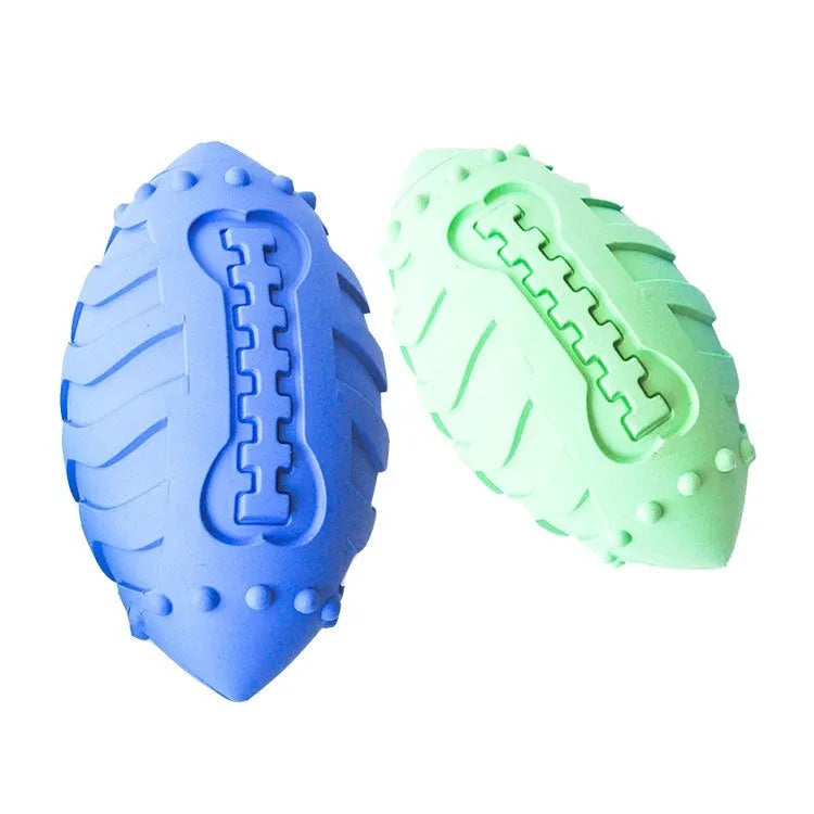 Thickened light green rubber rugby ball dog toy with vocal sound feature for chewing and interactive play.