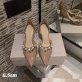 Women's black pointed patent leather high heel stiletto shoes with pearl decoration
