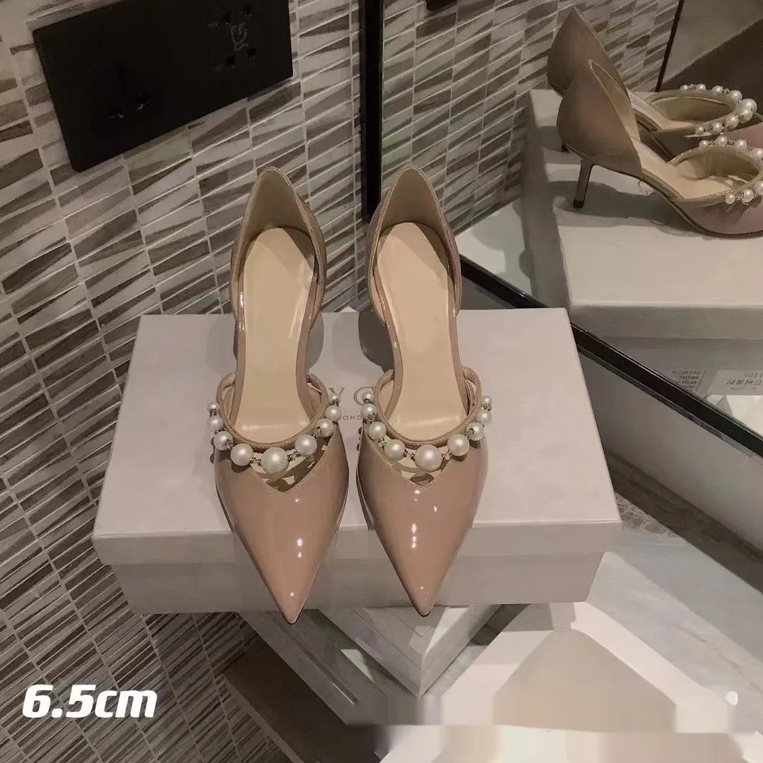 Women's black pointed patent leather high heel stiletto shoes with pearl decoration