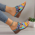 Women's ethnic totem design slippers in cowhide with coloured slope detailing and rubber soles