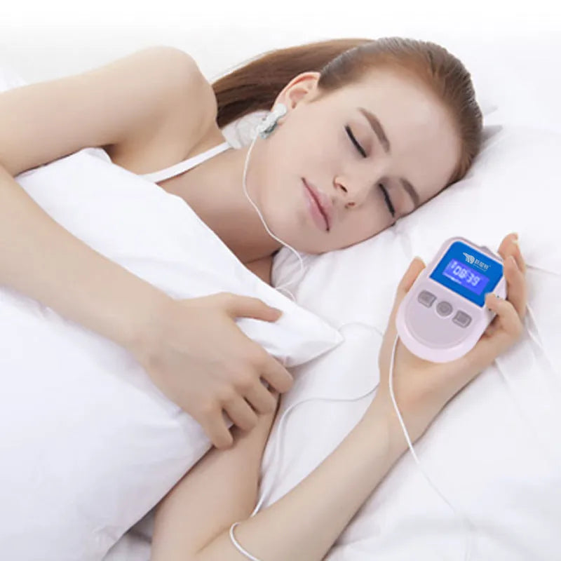 White HSM04 low frequency pulse therapy instrument for sleep aid, showing compact size.