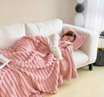 Soft, plush rabbit fur throw blanket in a variety of colors and sizes for cozy comfort at home or on the go.