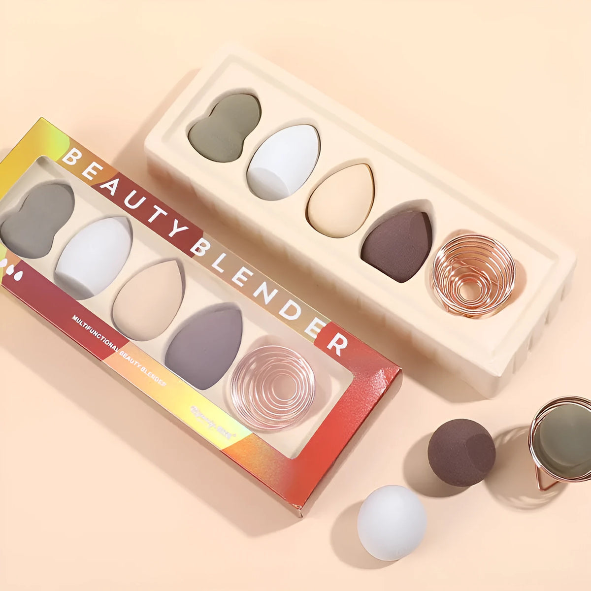 Four Hydrophilic Polyurethane beauty eggs in assorted colours on a metal stand, size 6x4cm each