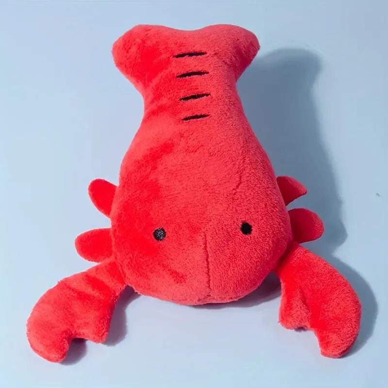 Red lobster stuffed dog toy with flapping tentacles on white background