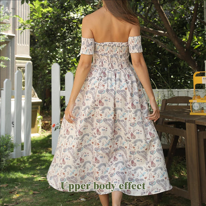 Women's off-shoulder strapless floral dress in a vibrant pattern, perfect for summer outings.