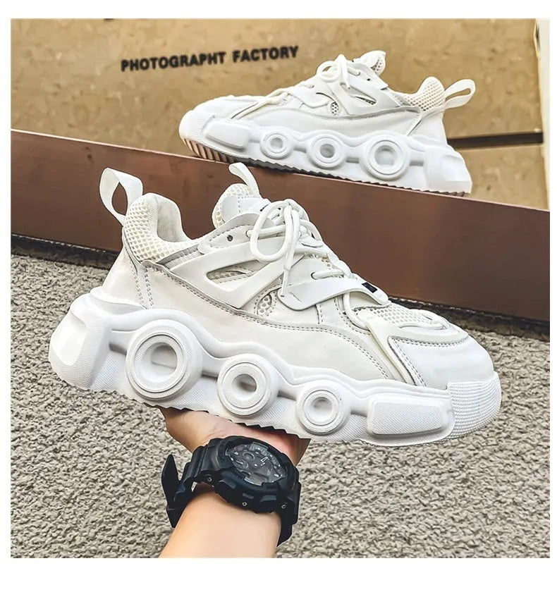 Men's black casual sneakers with a breathable mesh upper and thick rubber sole for height increase
