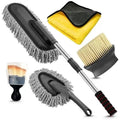 Car dust collector with retractable handle and five fibre brush heads on a car dashboard