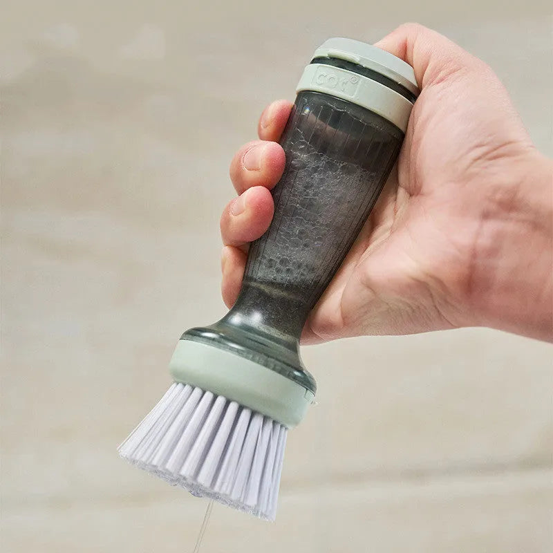Pot brush with soap dispenser in mint green colour showing replaceable brush head and non-scratch bristles