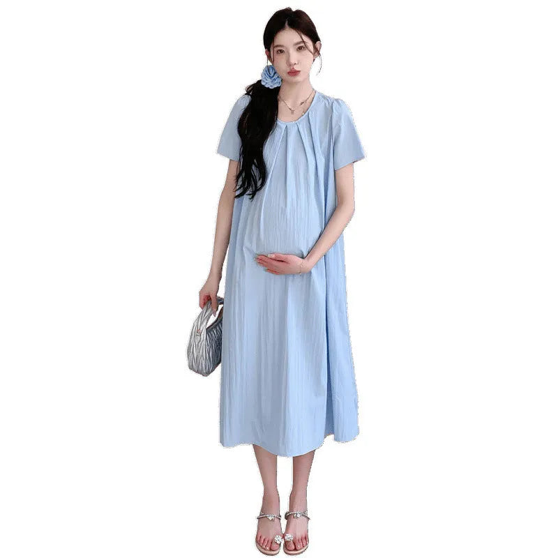 Loose summer maternity dress in sky blue with petal sleeves and nine-quarter length sleeves, street fashion style