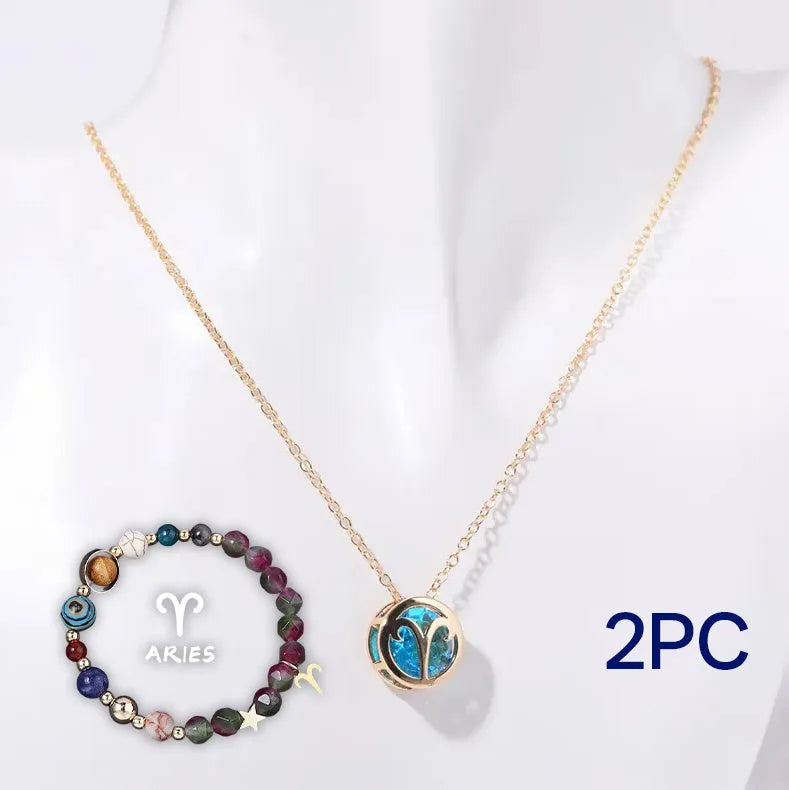 Natural stone beaded necklace and matching bracelet set on a textured background