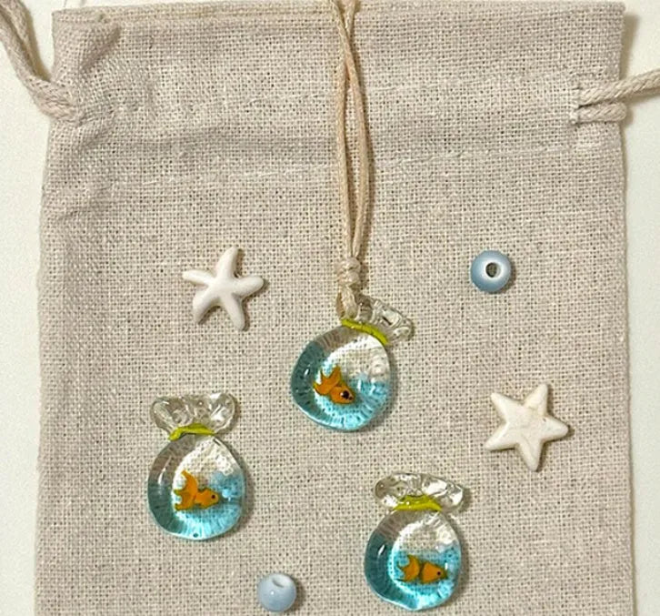 Women's skirt-shaped joker pendant necklace on a cotton and linen clavicle chain.