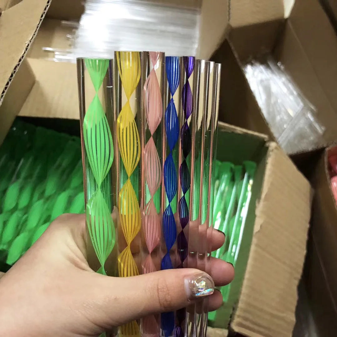 Pottery tool set containing acrylic ribs, stainless steel wire tools, and plastic sculpting tools inside a blue pen bag.