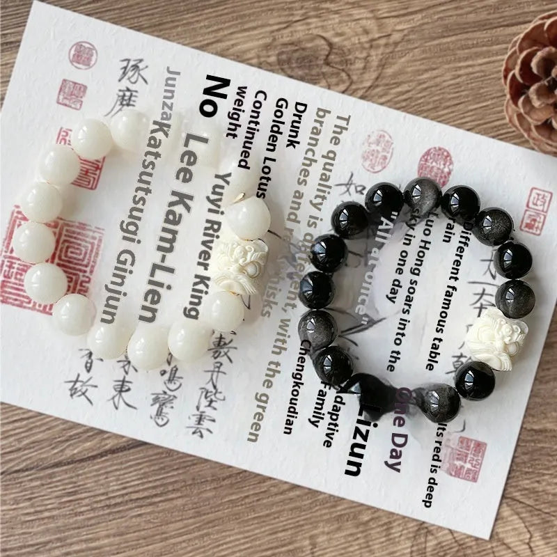 Obsidian prayer beads bracelet with manual processing and chamfered square grain details