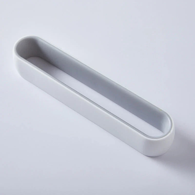 Wall-mounted bathroom slippers in pink, blue, and grey, made from 100% new plastic materials